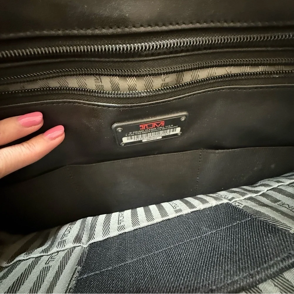 Tumi black leather